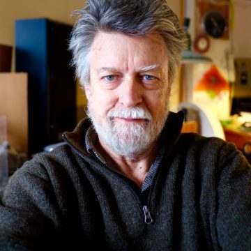 Asheville glass artist Carl Powell in his Grovewood Village studio.