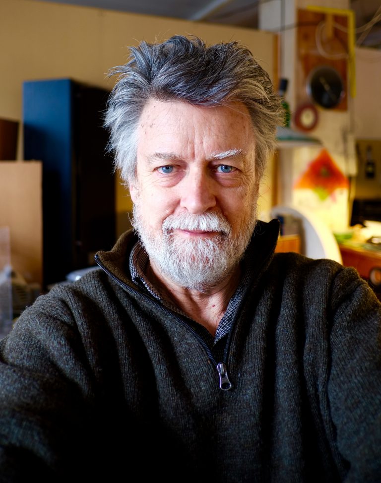 Asheville glass artist Carl Powell in his Grovewood Village studio.