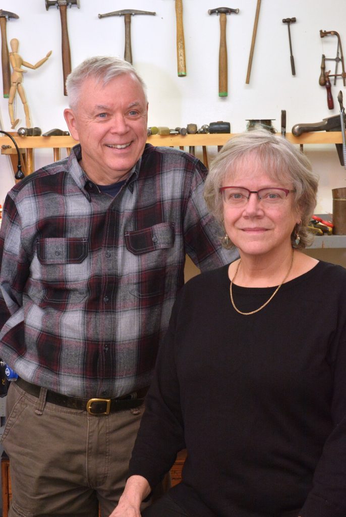 Asheville metalsmiths Tom Reardon and Kathleen Doyle in their Grovewood Village studio.