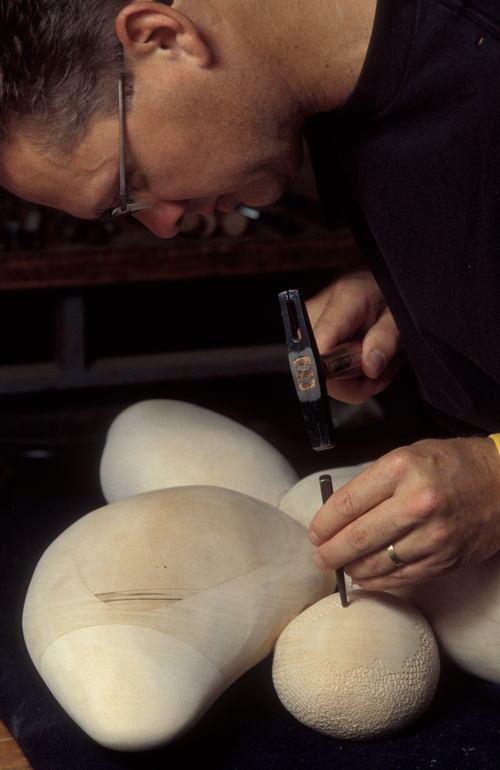 Fine furniture maker Brent Skidmore working in his Grovewood Village studio.