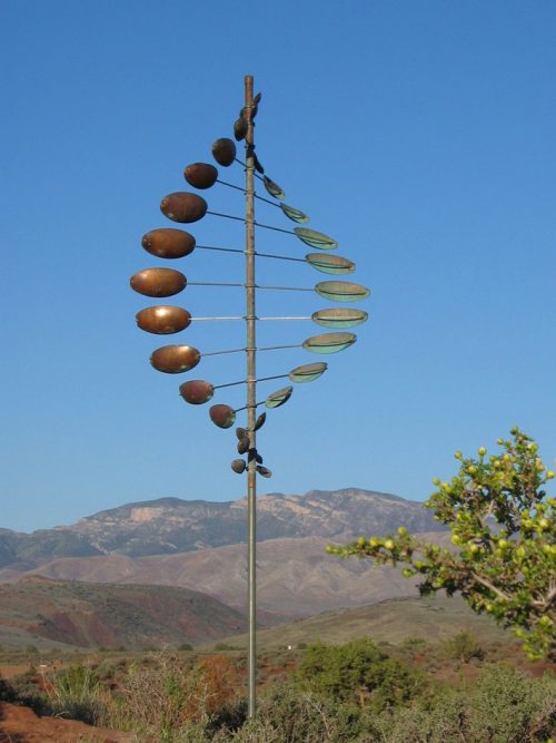 A double helix horizontal wind sculpture by Utah artist Lyman Whitaker.