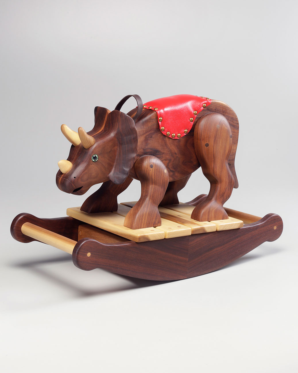 triceratops rocking horse