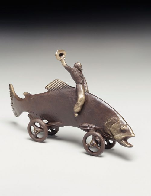 Bonze sculpture of a cowboy riding a trout.