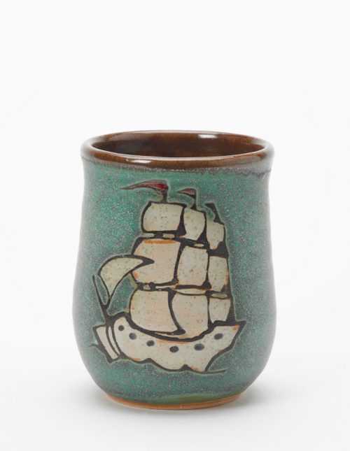Ceramic cup handmade by Hog Hill Pottery featuring Blackbeard's ship the Queen Anne's Revenge.