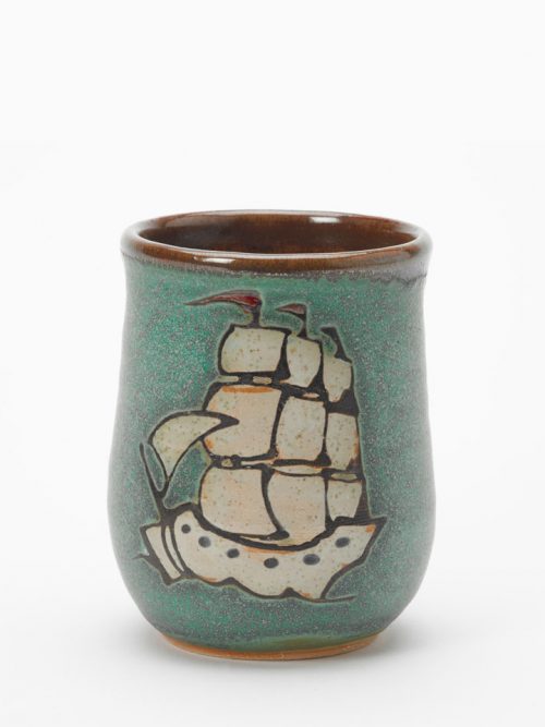 Ceramic cup handmade by Hog Hill Pottery featuring Blackbeard's ship the Queen Anne's Revenge.