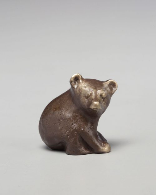 Cast bronze bear cub sculpture by Scott Nelles.