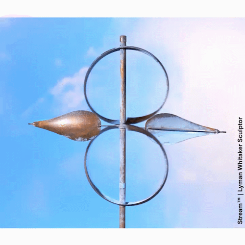 Stream wind sculpture by Lyman Whitaker in motion.
