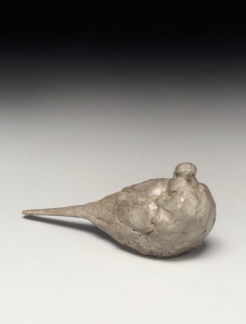 Small bronze dove sculpture by North Carolina artist Roger Martin.