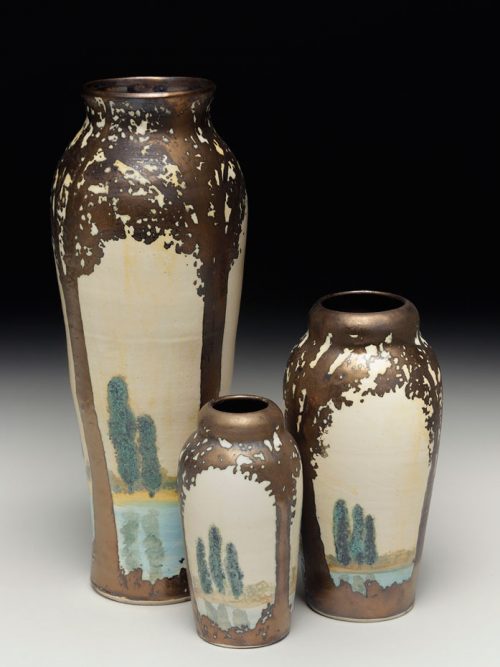 Ceramic vases featuring a scenic scene by Hog Hill Pottery.