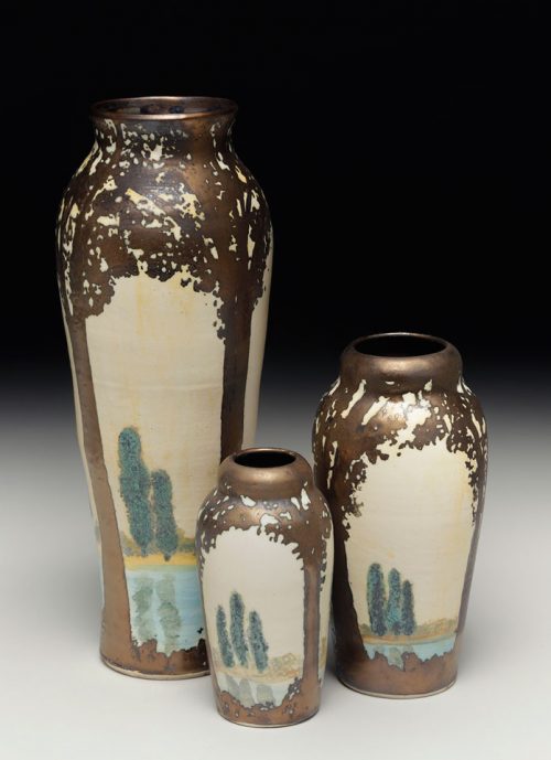 Ceramic vases featuring a scenic scene by Hog Hill Pottery.