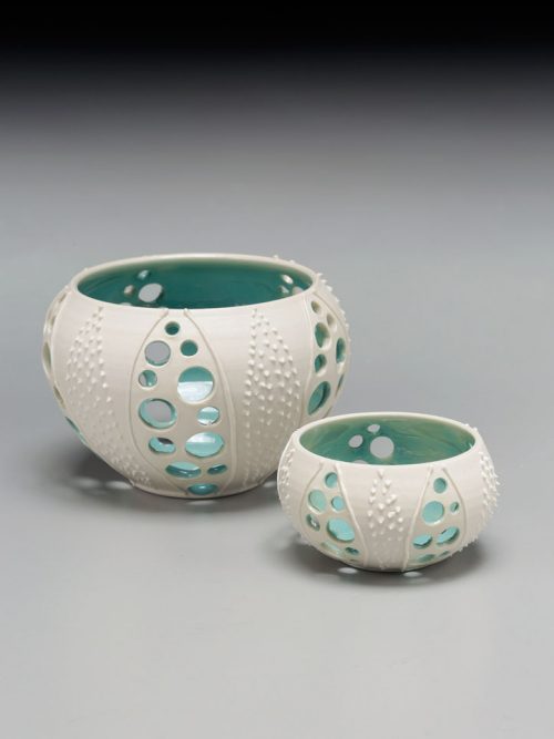 Porcelain sea urchin votives by Asheville potter Anja Bartels.
