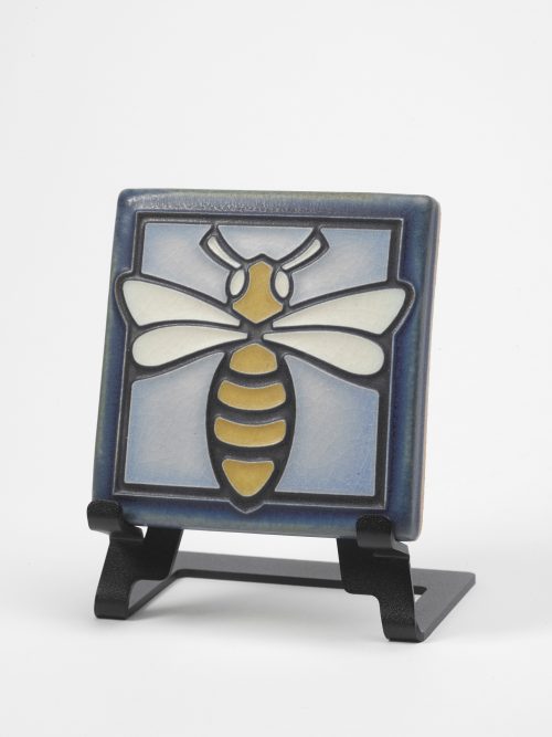 Light blue ceramic bee tile by Motawi Tileworks.