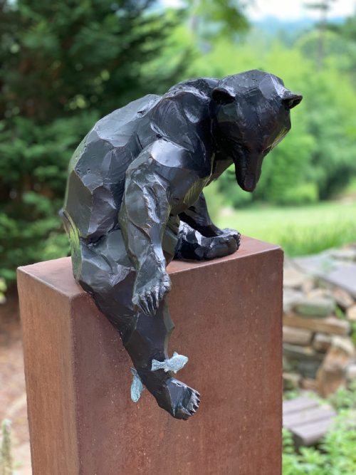 Bronze black bear sculpture by Roger Martin.