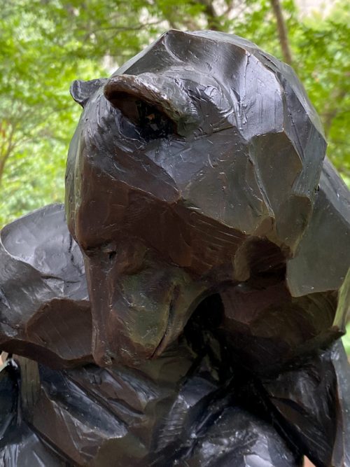 Detail of a bronze black bear sculpture by Roger Martin.