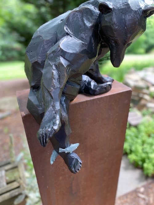 Detail of a bronze black bear sculpture by Roger Martin.