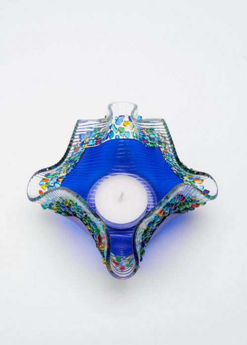 Top view of a cobalt blue glass votive by Jerry and Kathy Galloy.