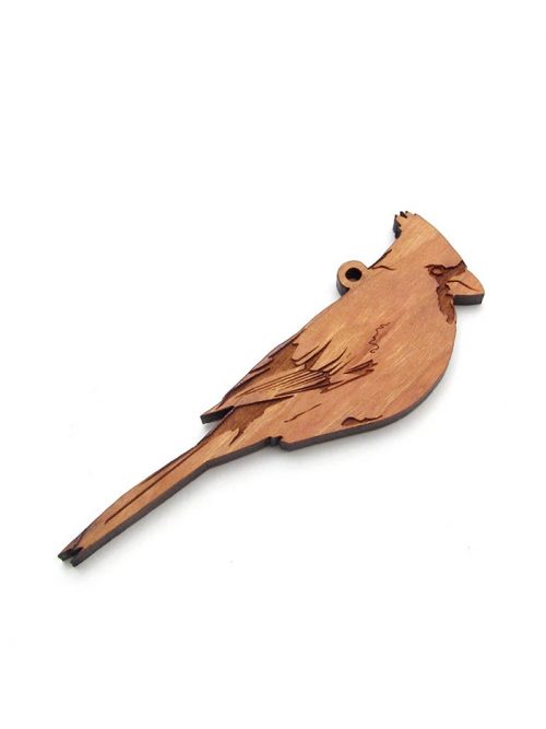 Wooden cardinal ornament by Nestled Pines Woodworking.