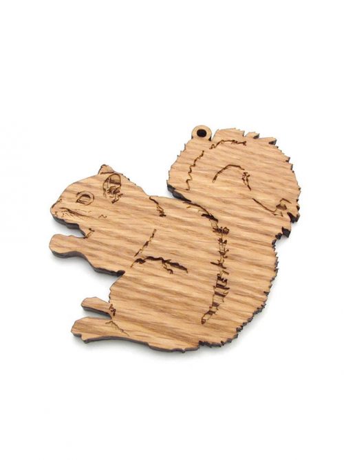 Wooden gray squirrel ornament by Nestled Pines Woodworking.