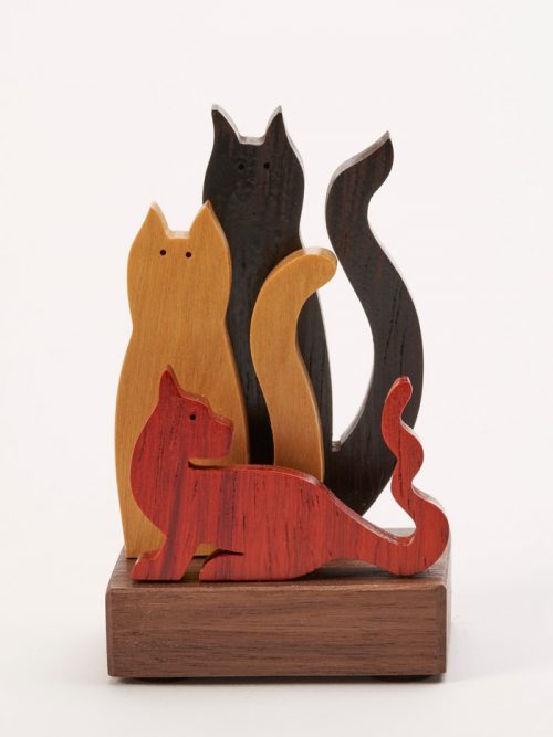 Small wooden sculpture of 3 cats by artist Jerry Krider.