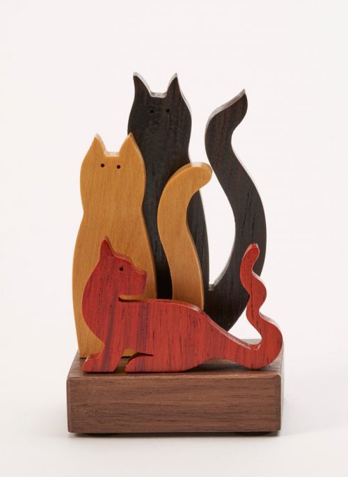 Small wooden sculpture of 3 cats by artist Jerry Krider.