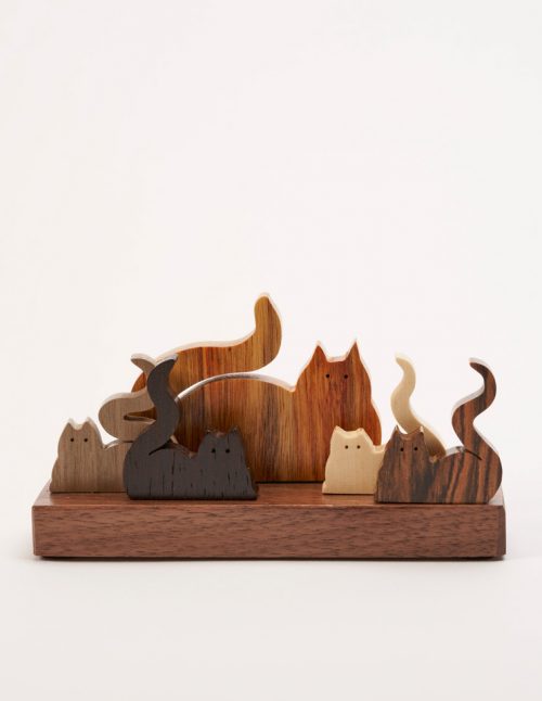 Wooden sculpture of 5 cats by artist Jerry Krider.