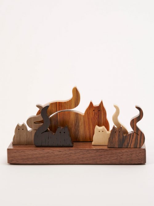 Wooden sculpture of 5 cats by artist Jerry Krider.
