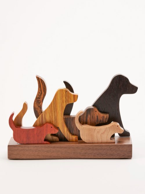 Wooden dog sculpture by artist Jerry Krider.