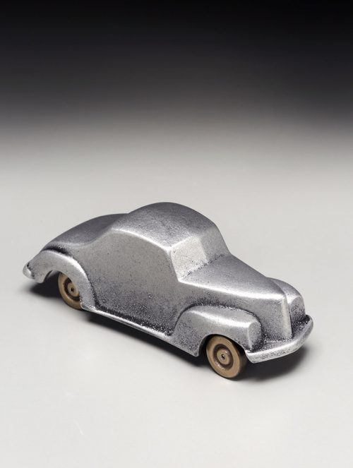 Small metal sculpture of a 1940 ford coupe handcrafted by Scott Nelles.