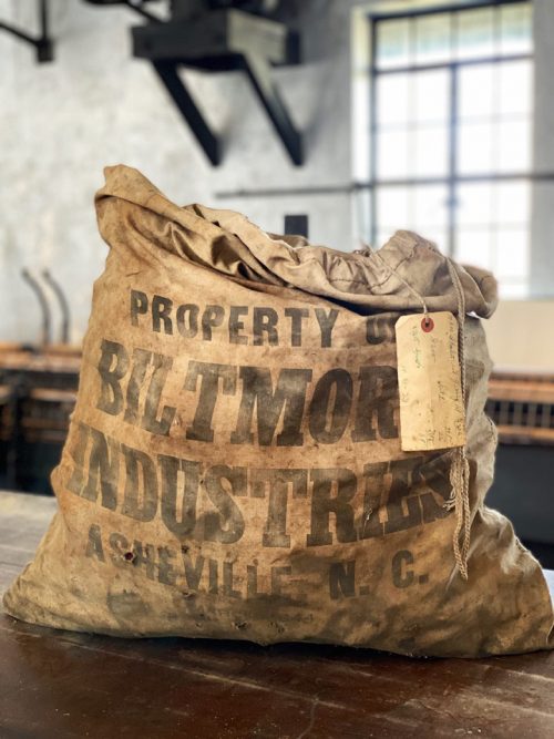 Old sack of weaving bobbins at Biltmore Industries in Asheville, NC.