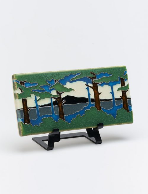 Ceramic art tile of a pine landscape by Motawi Tileworks of Ann Arbor, Michigan.