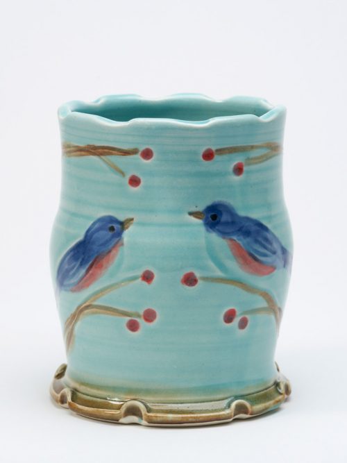 Wheel-thrown, stoneware tumbler with a bluebird motif by North Carolina studio potter Vicki Gill.
