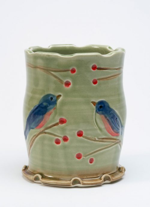 Handcrafted, wheel-thrown tumbler with a bluebird motif by North Carolina studio potter Vicki Gill.