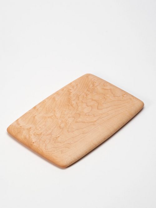 Small birds-eye maple cutting board handcrafted by Edward Wohl.