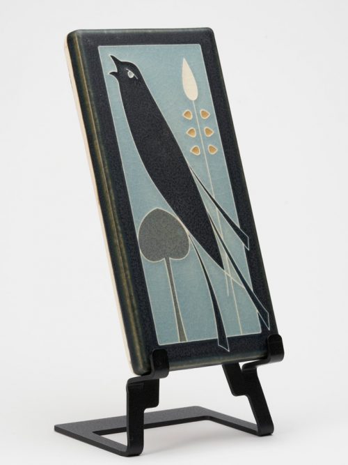 A ceramic art tile with a songbird design by Motawi Tileworks.