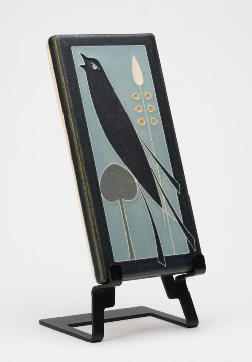 A ceramic art tile with a songbird design by Motawi Tileworks.