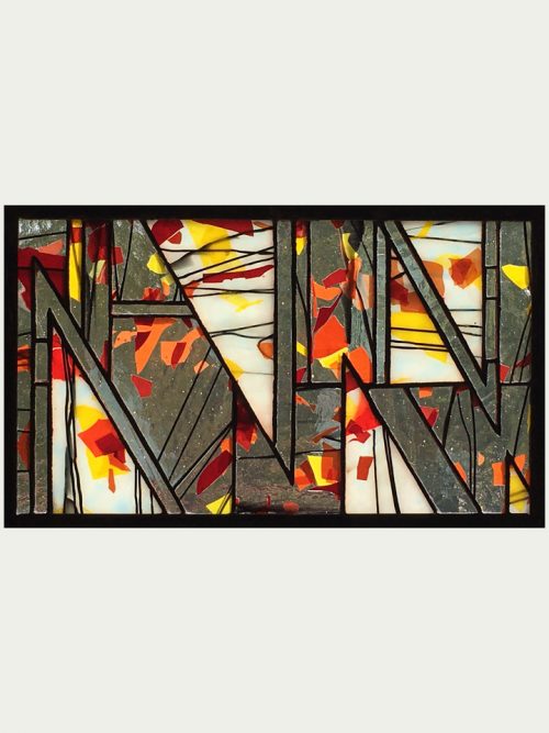 A stained glass window panel by Jacob Hinnenkamp of Hinnenkamp Glass Crafters.