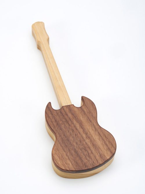 A guitar-shaped keepsake box perfect for storing small trinkets and treasures.