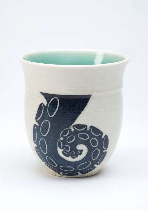 Tentacle tea cup handmade by Asheville studio potter Anja Bartels.