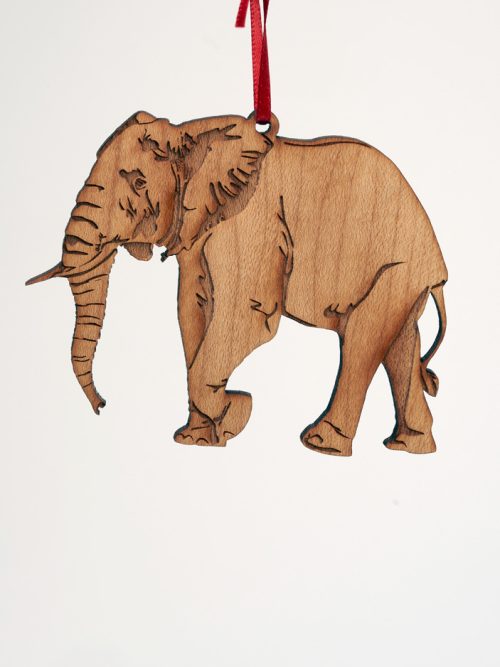 Handmade African elephant ornament by Nestled Pines Woodworking.