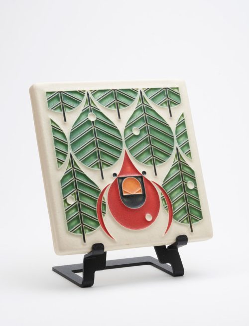 This Coniferous Cardinal art tile by Motawi Tileworks depicts a lone cardinal perched among the conifers on a snowy winter's day.