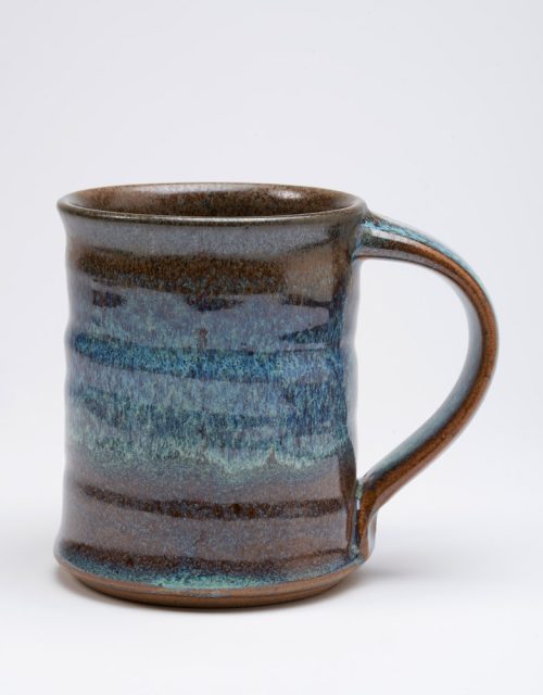 Ceramic mug with a blue galaxy glaze handmade by potter Steve Tubbs.