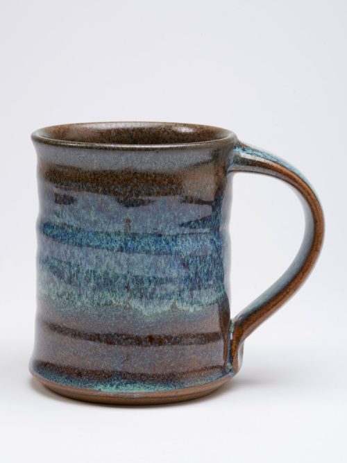 Ceramic mug with a blue galaxy glaze handmade by potter Steve Tubbs.
