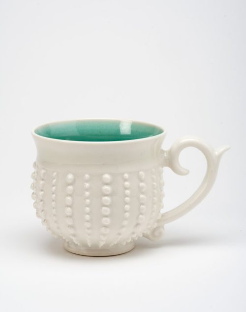 Handmade porcelain sea urchin mug by Asheville-based studio potter Anja Bartels.