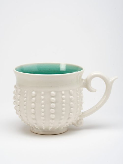 Handmade porcelain sea urchin mug by Asheville-based studio potter Anja Bartels.