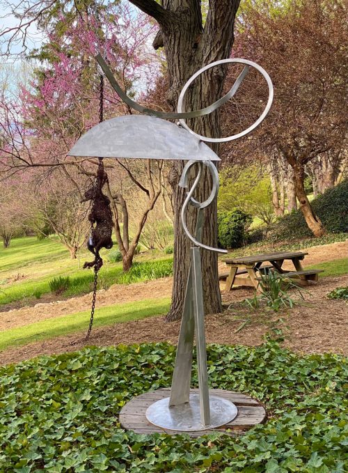 Stainless steel garden sculpture by Aldon Addington.