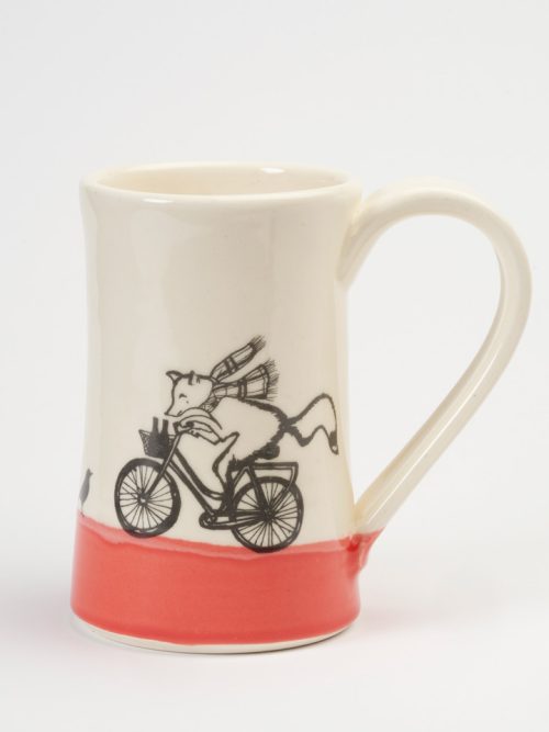 A red and white ceramic mug handmade by Darn Pottery that features a fox riding a bike with beers in his basket.