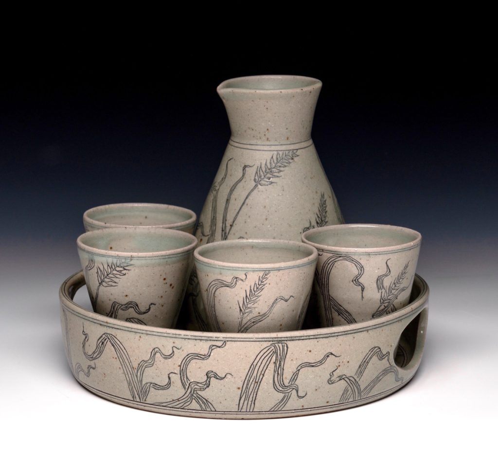 Ceramic wild grass wine set by potter Ayla Mullen, a featured artist in the Vessels of Merriment exhibition at Grovewood Gallery..