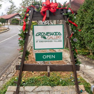 Exterior sign of Grovewood Gallery in Asheville, NC during Christmas.