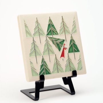 A ceramic art tile featuring Christmas trees by Motawi Tileworks.