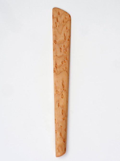 A birdseye maple pâté spreader handmade by artist Edward Wohl.
